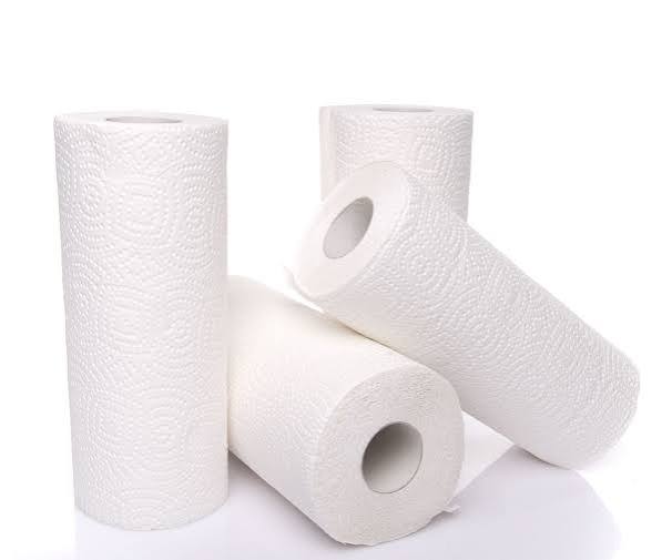 Four white paper towel rolls.